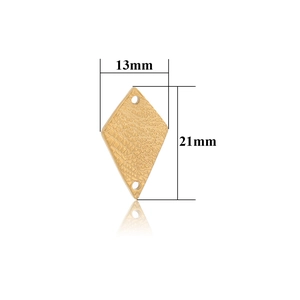 Macro view of golden rhombus pendant with textured surface and size measurements
