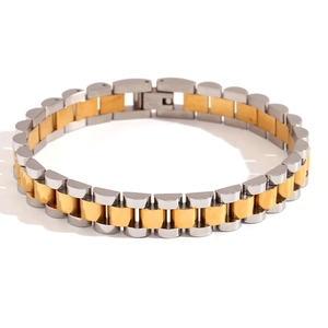 Detail of two-tone 18K gold plated stainless steel watch-style link bracelet with clasp
