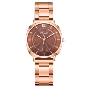 Elegant rose gold women's quartz watch with brown sunburst dial and metal link bracelet