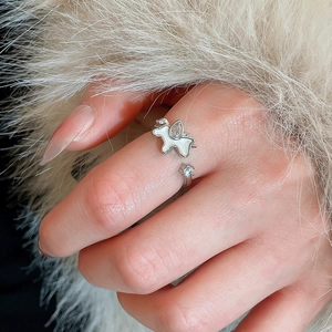 Detailed shot of silver adjustable star ring with mother of pearl shell and zircon