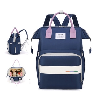 Deep blue diaper backpack showing multi-angle views and large opening storage space