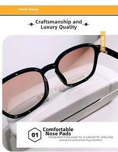 Detail of integrated nose pads on black oversized polarized sunglasses with gradient lenses