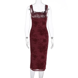 Detail of wine red floral lace fabric with rose jacquard pattern on a slim summer dress