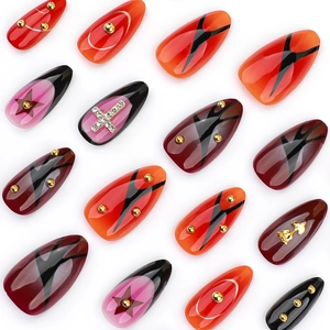 3D rose almond press-on nails with cross charms and rhinestones in red and black