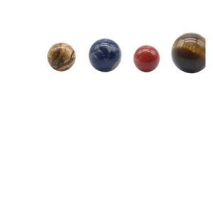 Polished natural crystal solar system planet spheres including tiger eye and agate stones