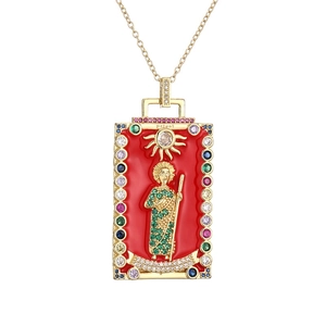 Vintage gold plated pendant necklace with red enamel saint icon and colored gemstones