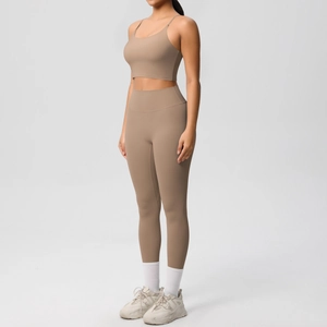 Detail view of mocha yoga set with spaghetti strap sports bra and high-waisted leggings
