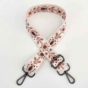 Adjustable canvas shoulder strap with colorful ethnic floral embroidery and gunmetal hooks