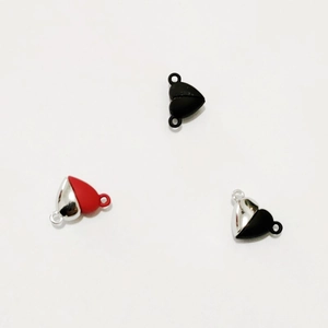Detailed view of heart-shaped magnetic clasp connectors for DIY bracelet and jewelry making