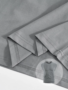Detail shot of a gray men's sleeveless tank top showing reinforced double-stitched hem