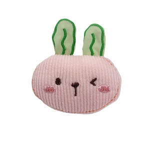 Pink fabric rabbit head with green ears and embroidery for hair accessories or brooches