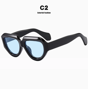 Retro irregular sunglasses featuring a thick black frame and light blue tinted lenses for fashion