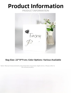 Detail view of Team Bride white wedding gift bag with silver foil lettering and dimensions