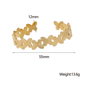 Detailed view of butterfly pattern gold bangle with 12mm width and 55mm inner diameter