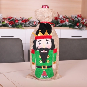 Detail of Nutcracker wine bottle cover made of burlap and felt for Christmas decor