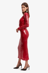 Detail of red sequin long sleeve slim dress showing fabric texture and side silhouette