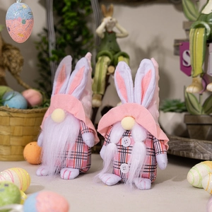 Detail of pink plaid Easter gnome plush bunnies with white beards for festive home decor