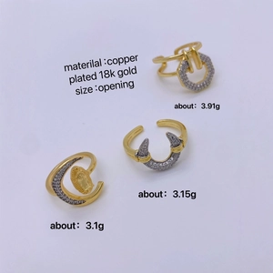 Three 18K gold plated copper opening rings with cubic zirconia in geometric designs