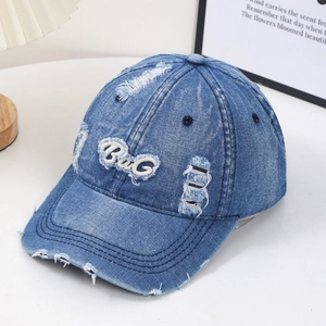 Vintage blue washed denim baseball cap with 3D B&G embroidery and distressed holes