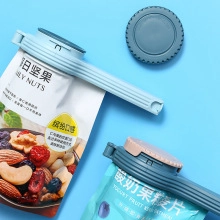 Detail of blue plastic sealing clips with pouring spouts for snack bags