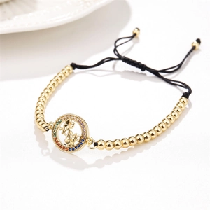 Bracelet MAMA ajustable plaqué or avec zircons colorés et cordon tressé noir