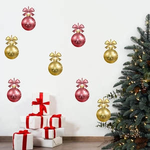 8-piece Christmas ball wall stickers in red and gold with snowflake patterns on a wall