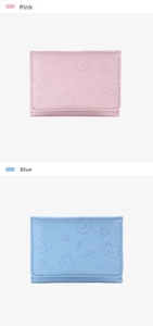 Detail showing pink and blue PU leather wallets with cute 3D cartoon embossing