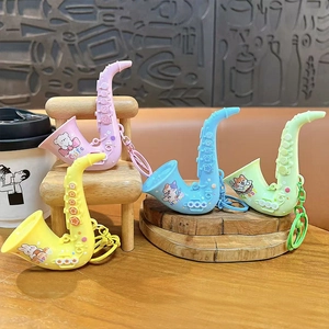 Colorful saxophone shaped keychains with cute cartoon animal designs for bag accessories