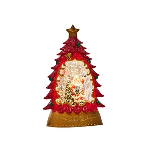 Red Christmas tree snow globe with Santa figure and sparkling gold glitter base