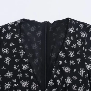 Chic black floral dress with elegant white print and hidden back zipper detail