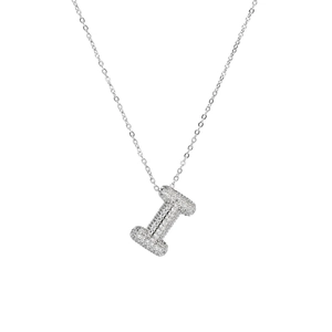Detailed view of silver bubble letter I pendant with sparkling cubic zirconia inlay