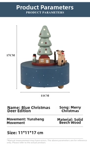 Detailed specs of blue wooden Christmas music box with reindeer and tree ornaments