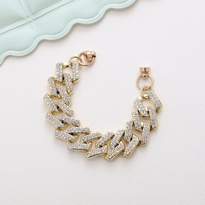 Luxurious gold iced out Cuban link phone wrist strap with sparkling rhinestone crystals
