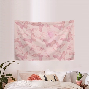 Pink butterfly tapestry hanging on bedroom wall as a decorative aesthetic backdrop