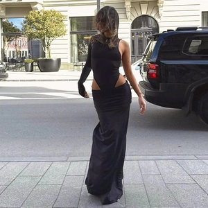 Women's black asymmetrical cutout bodysuit and slim maxi skirt two-piece set