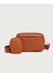 Close-up of brown quilted crossbody bag with wide strap and detachable coin purse