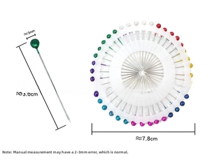 Detail showing colorful pearl head sewing pins with precise dimensions and sizes