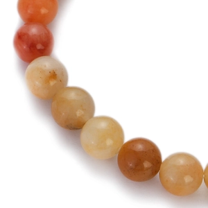 Macro shot of colorful chalcedony agate beads with natural stone texture and gradients