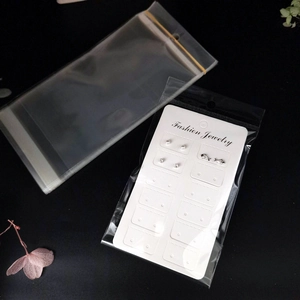 Detail view of 12-pair jewelry display cards and PE bags with Fashion Jewelry text