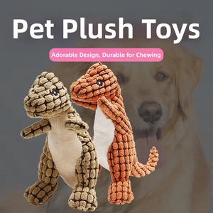 Close-up of textured corn velvet fabric on two plush dinosaur dog toys with chew nubs