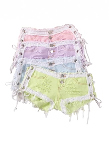 Pantalones cortos de mezclilla sexys de tiro bajo con flecos y cordones de macaron