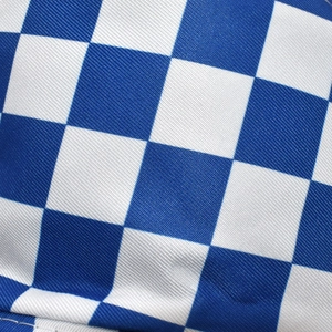 Detailed macro shot of the blue and white checkered twill fabric on the bucket hat