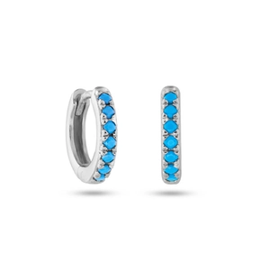 Detail of silver hoop earrings with blue zircon stones and snap-post closure