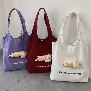 Three canvas tote bags in purple, burgundy and white with 3D plush cat doll decorations