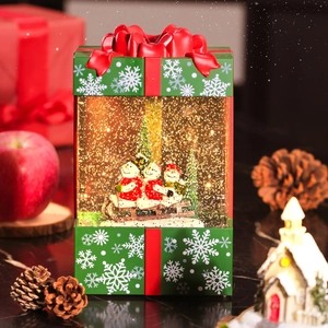 Christmas musical snow globe gift box with LED lights and snowman winter scenery