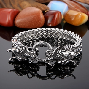 Bracelet tête de dragon en argent avec chaîne tressée et pierres précieuses polies