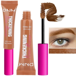 Detailed views of brown brow mascara with hair-like fibers for thickening effects