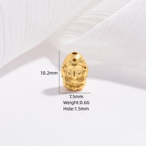 Detailed macro view of a golden Buddha head charm bead with 10.2mm height dimensions