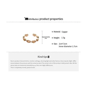 Guida alle dimensioni per anello in rame placcato oro 18k con zirconi e design a maglia