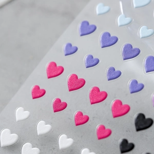 5D embossed heart nail art stickers with matte texture and glitter in various colors